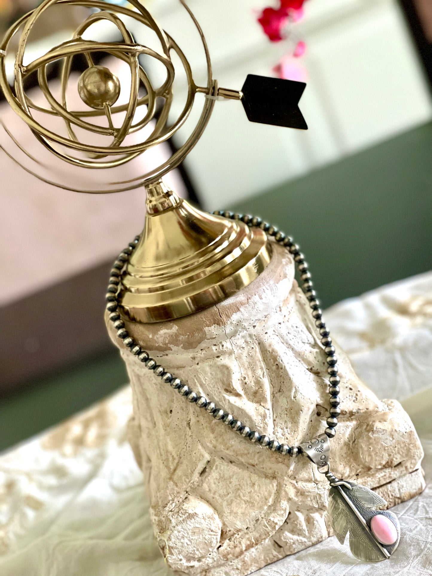 Pink-Conch Feather on Navajo Pearls