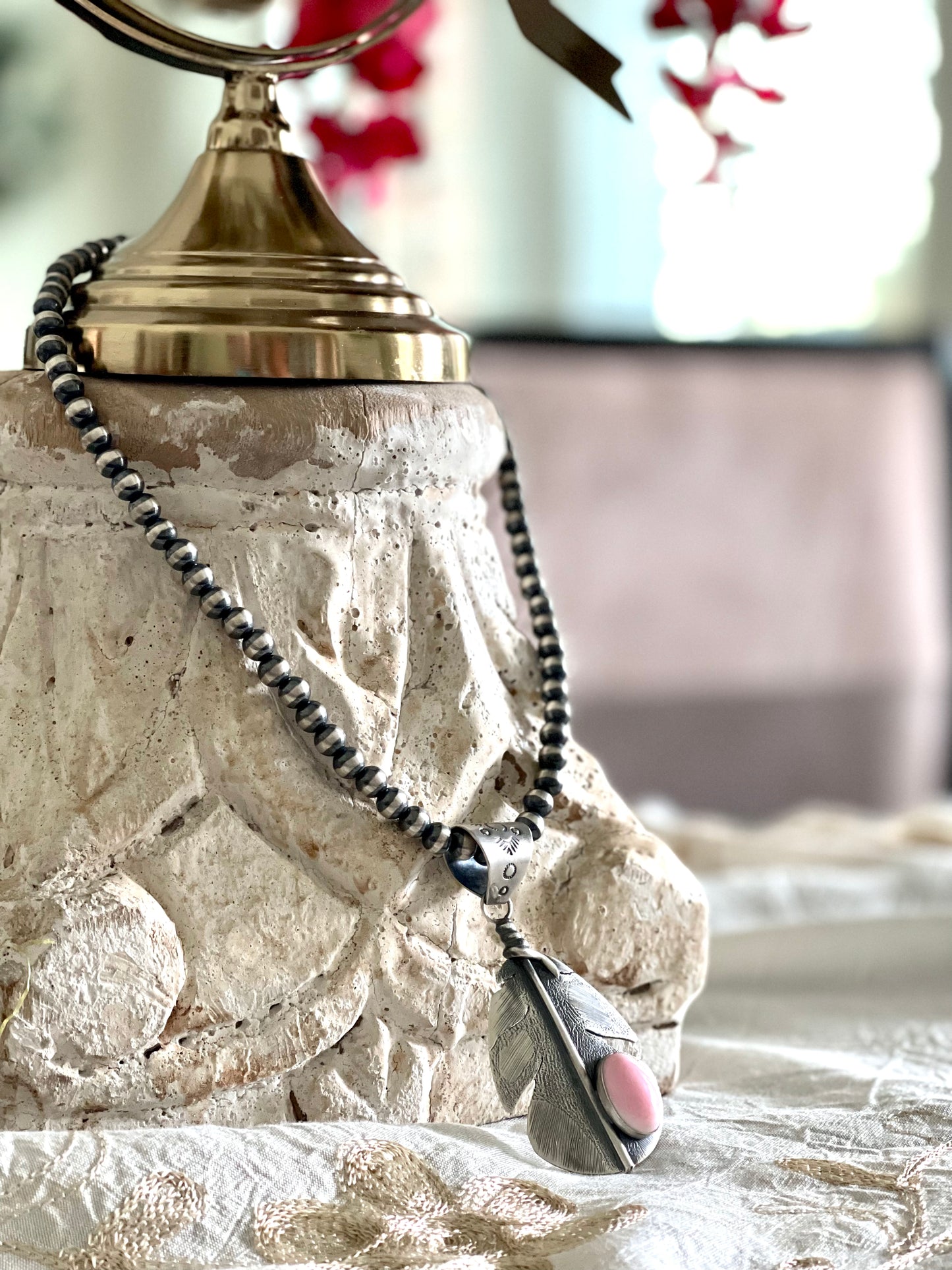 Pink-Conch Feather on Navajo Pearls