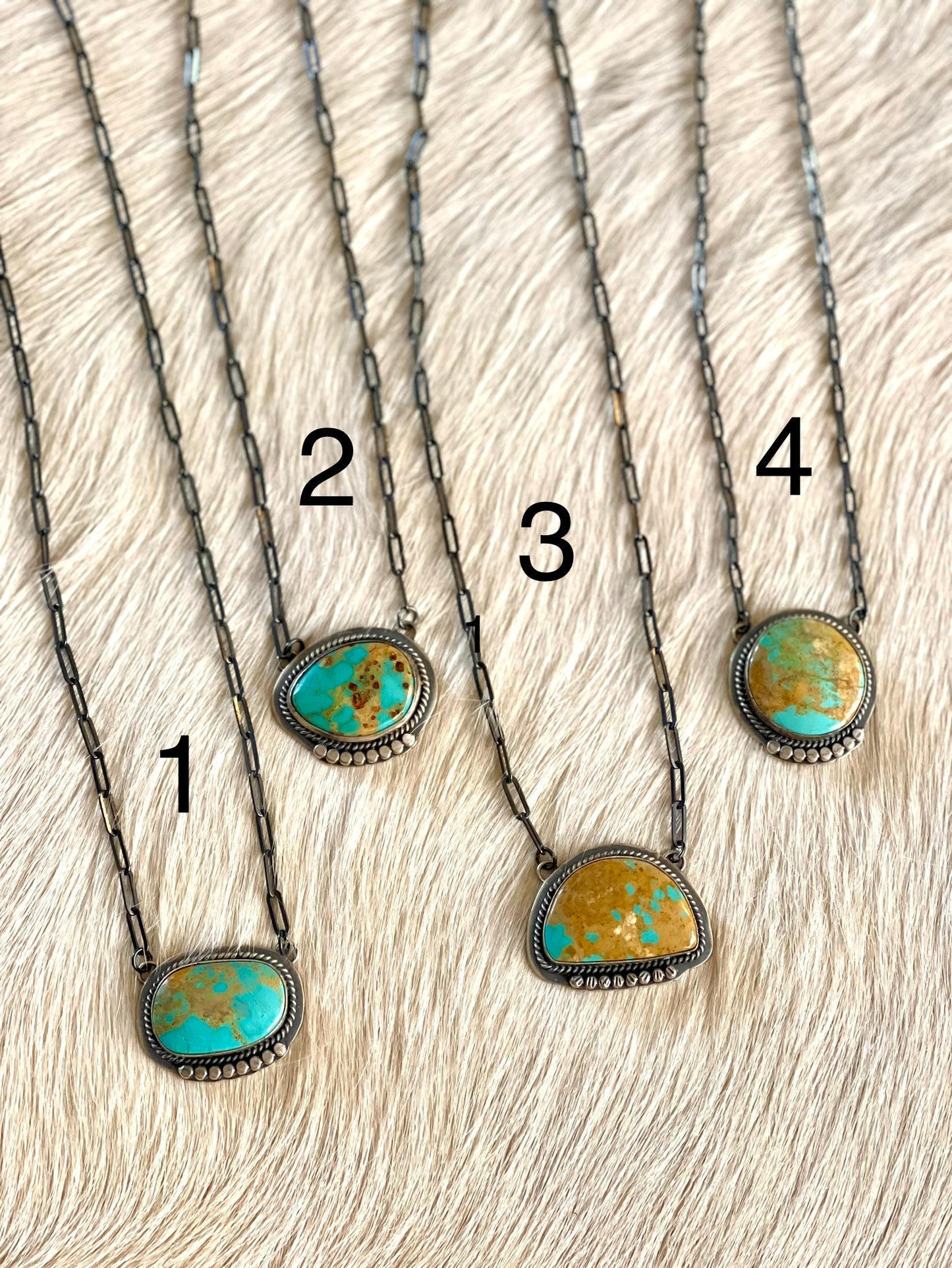 Oval Turquoise w/silver Pinhead Detailing