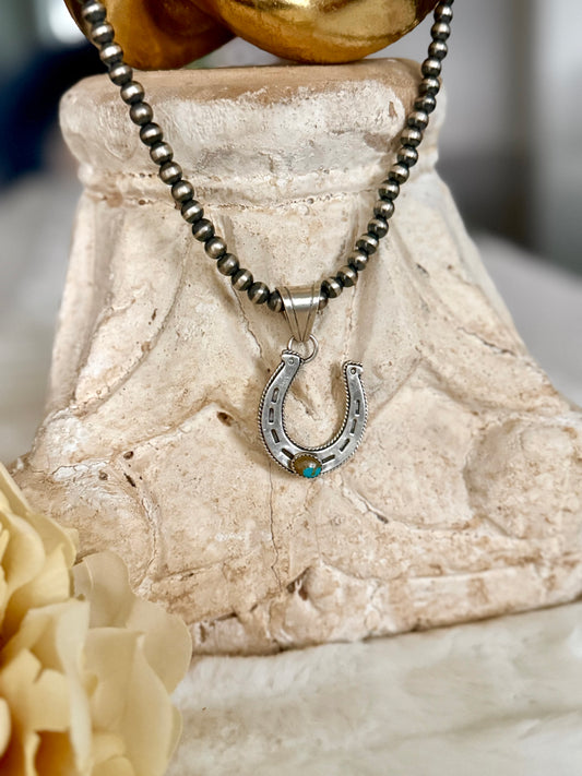 Horseshoe Pendant on Navajo Pearl Necklace