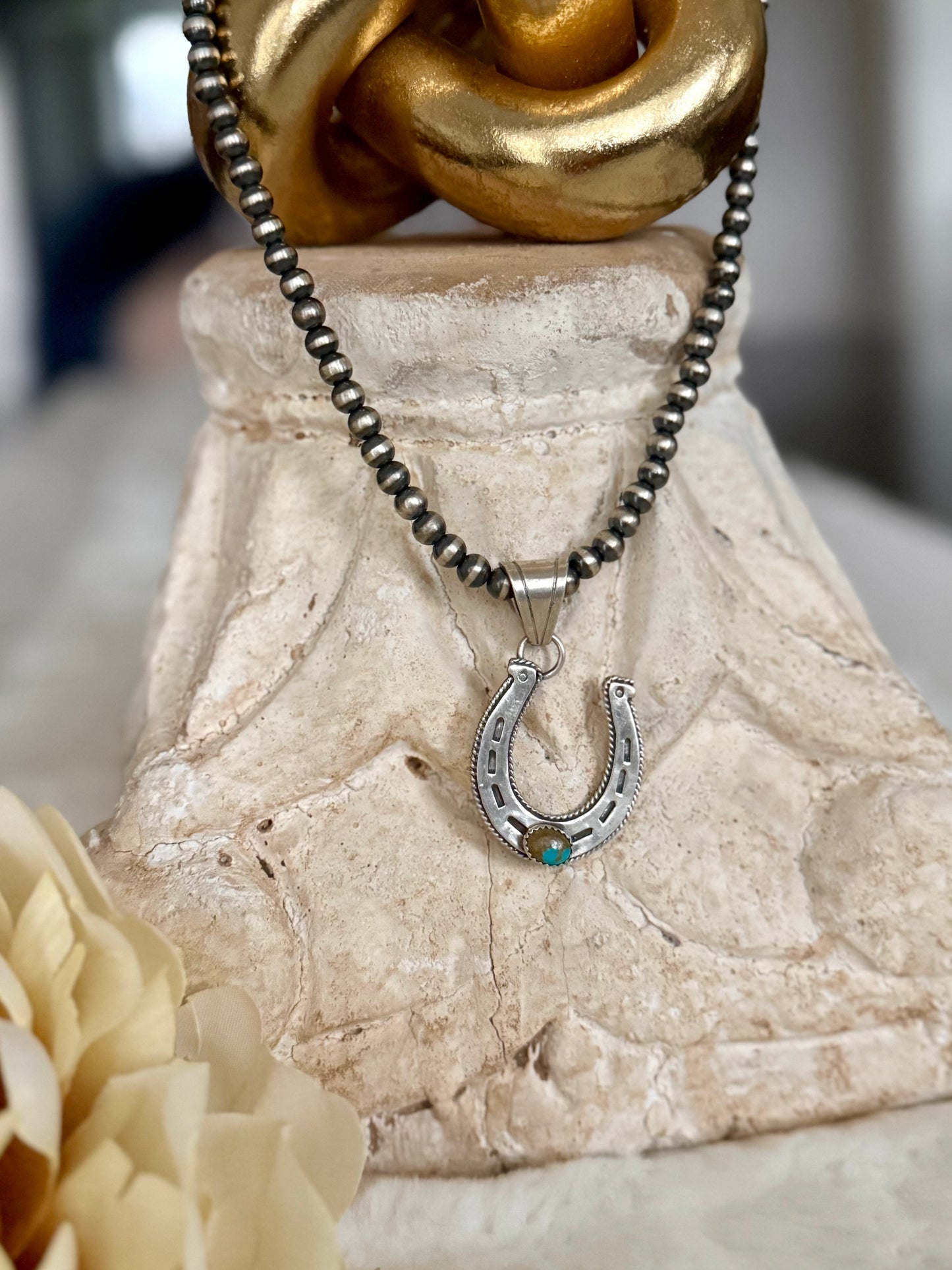 Horseshoe Pendant on Navajo Pearl Necklace