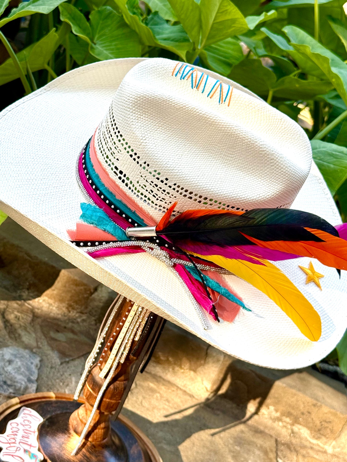White straw hat with Retro Spurs colorful decorations. Custom San Antonio Spurs straw hat with removable feather clip.