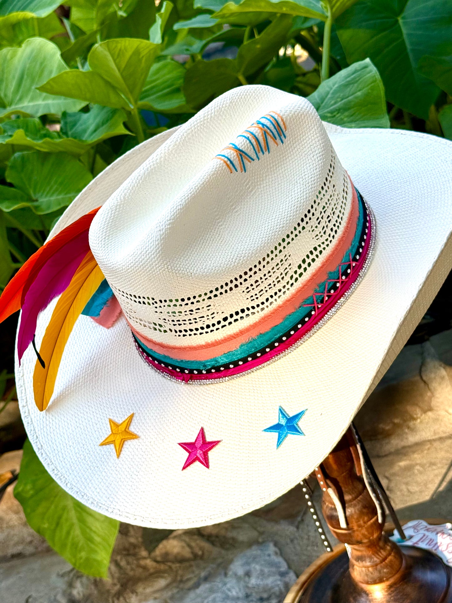 White straw hat with Retro Spurs colorful decorations. Custom San Antonio Spurs straw hat with removable feather clip.