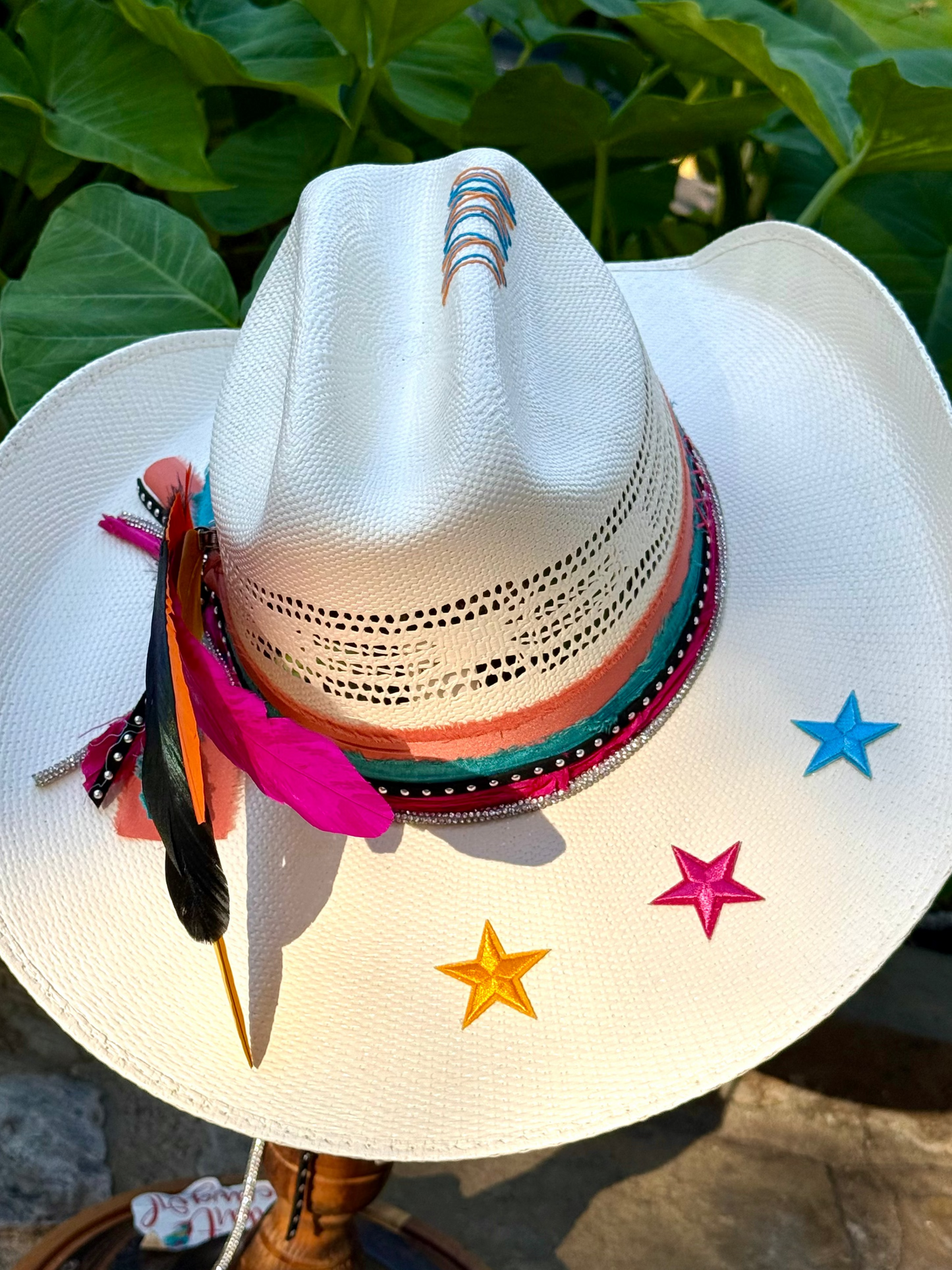 White straw hat with Retro Spurs colorful decorations. Custom San Antonio Spurs straw hat with removable feather clip.