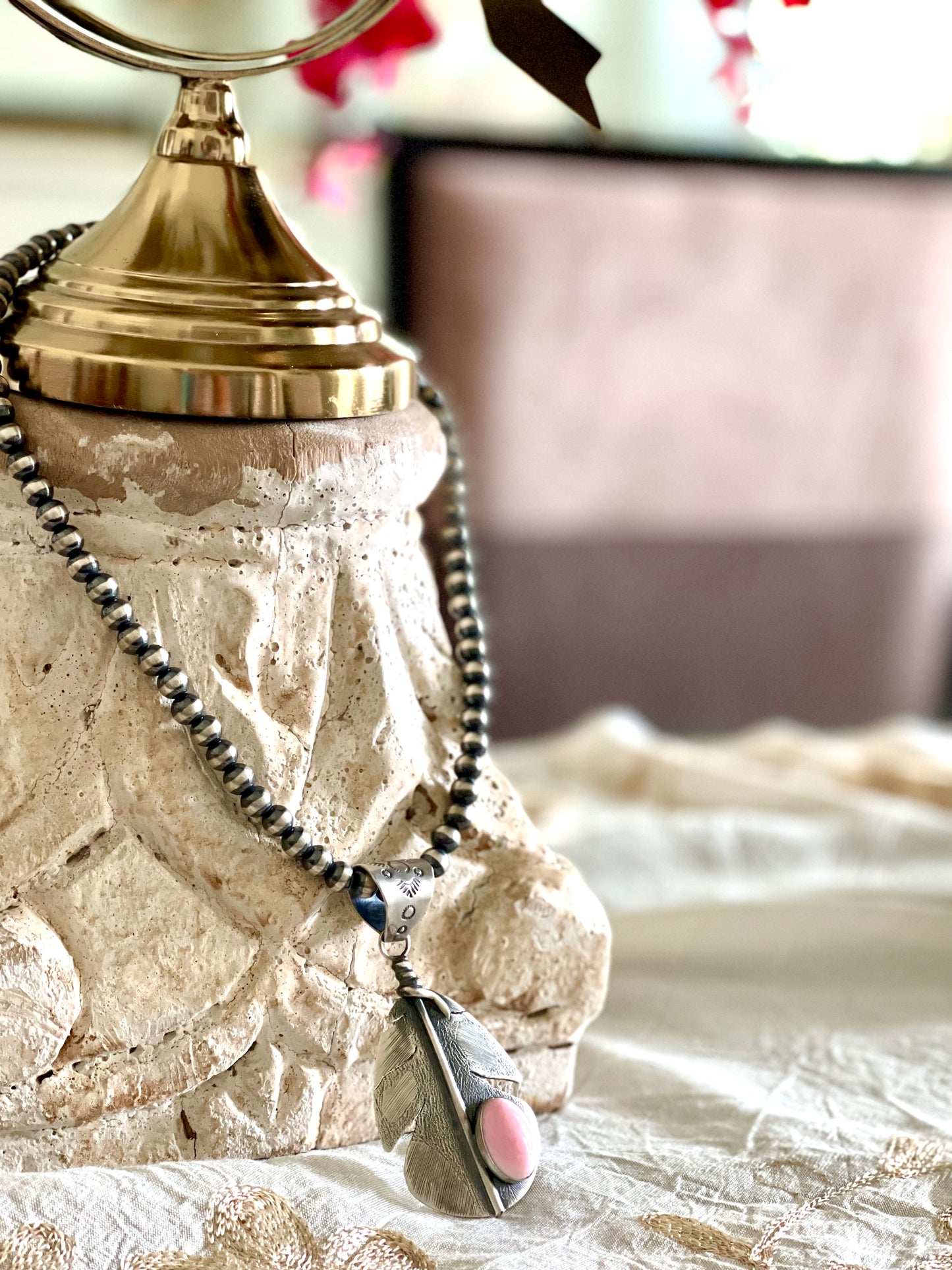 Pink-Conch  Feather on Navajo Pearls