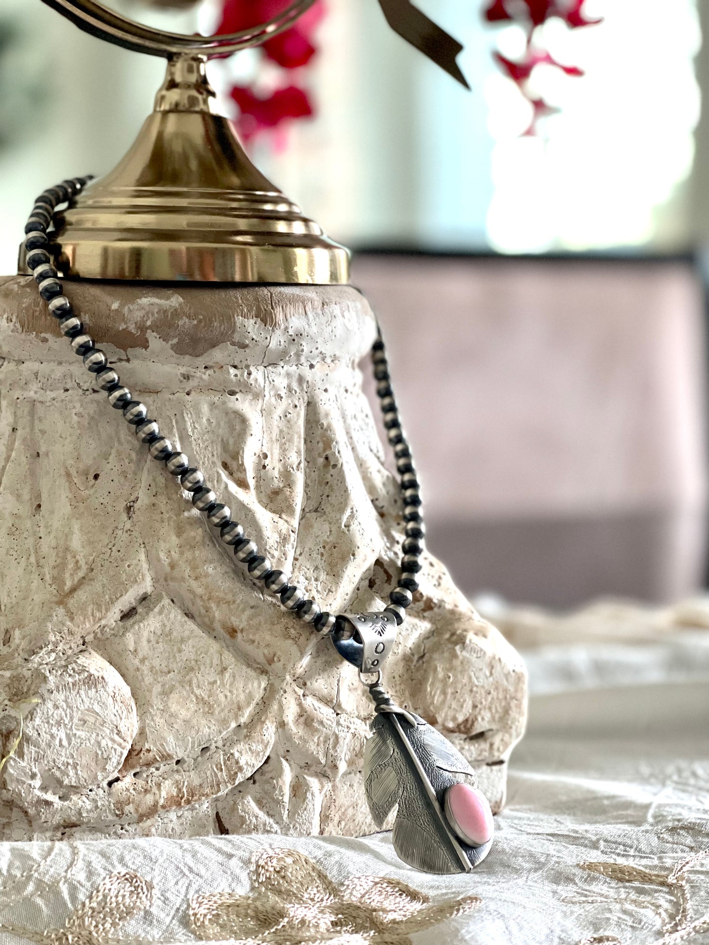 Pink-Conch  Feather on Navajo Pearls